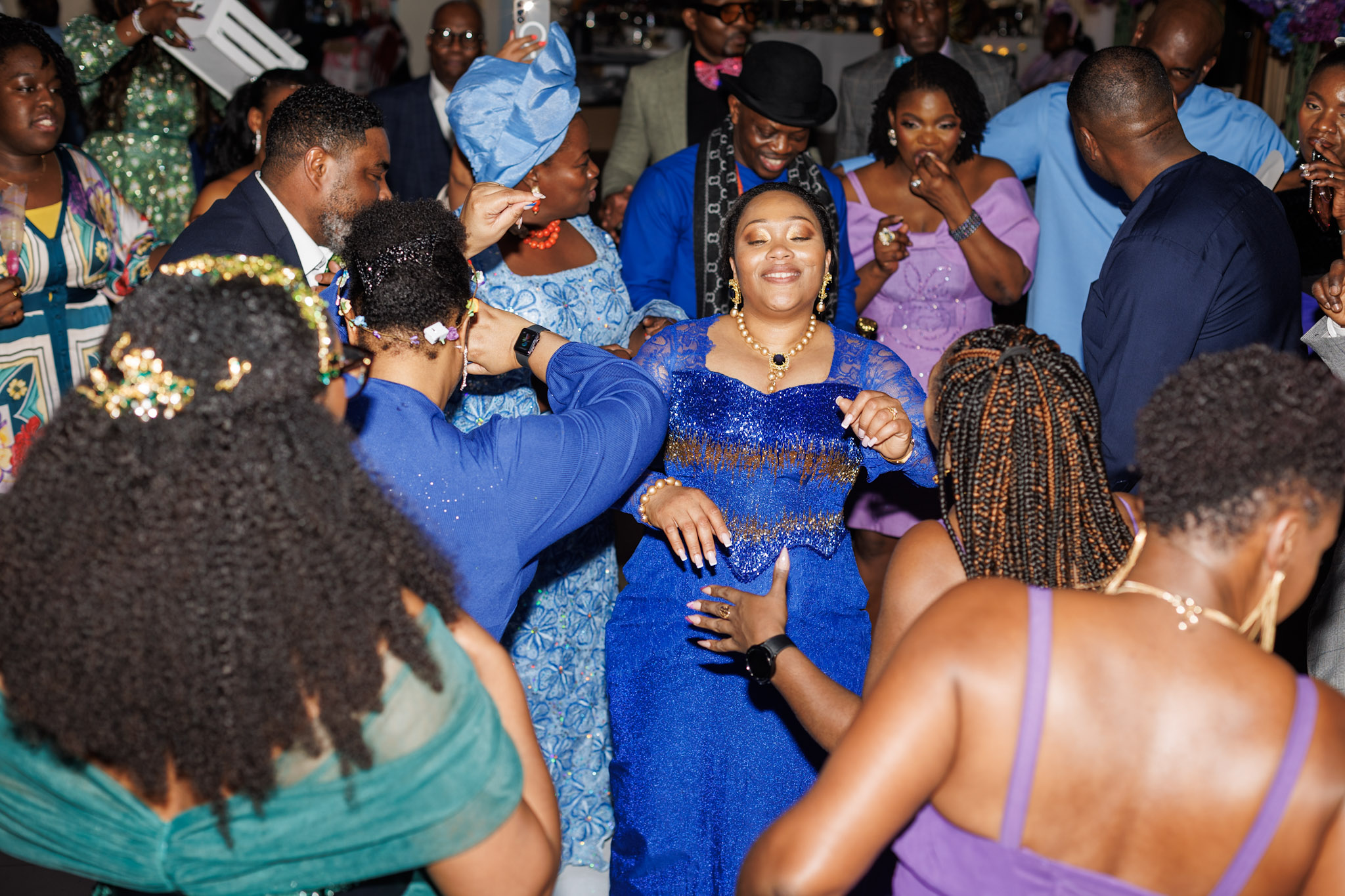 Wedding guests celebrating on the dance floor